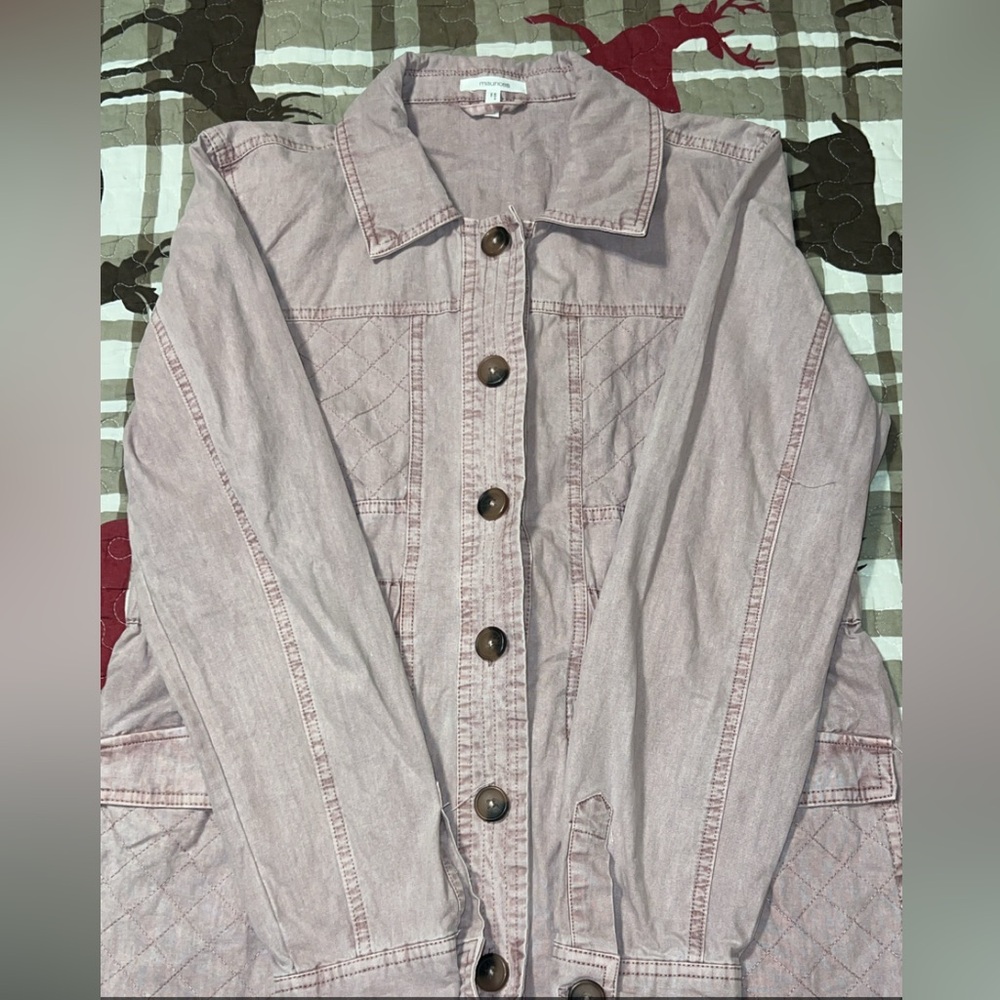 Maurice’s button up jacket, never worn.